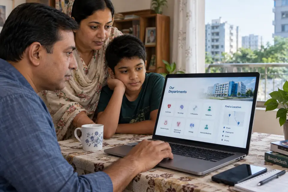 At home in Bangladesh, a family member researches hospital departments on a laptop and checks which location offers the needed service.