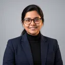 Monwara Moni — Content & Social Communication Monwara Moni in a professional studio portrait